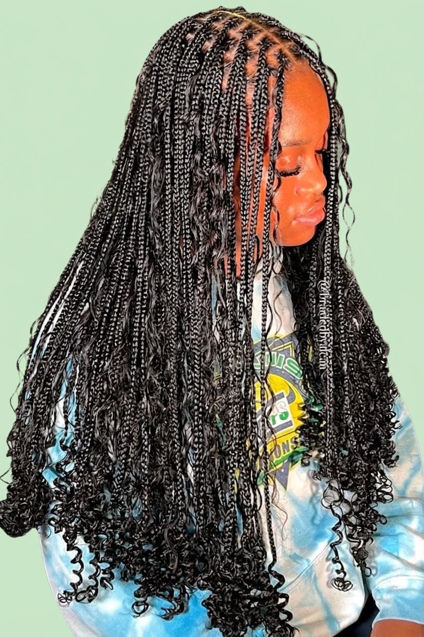 Knotless boho braids styled at the salon